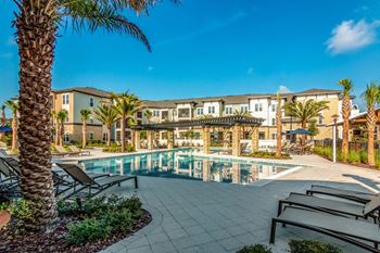 Swimming pool with poolside cabana and shade arbor